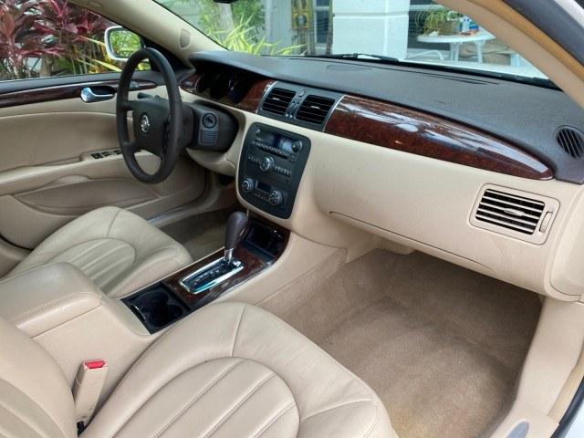 2011 White Diamond Tricoat /Cocoa/Cashmere Buick Lucerne CXL LOW MILES 39,527 (1G4HC5EM2BU) with an 3.9L V6 SFI Flex-Fuel Engine engine, Automatic transmission, located at 4701 North Dixie Hwy, Pompano Beach, FL, 33064, (954) 422-2889, 26.240938, -80.123474 - OUR WEBPAGE FLORIDACARS1.COM HAS OVER 100 PHOTOS AND FREE CARFAX LINK 2011 Buick Lucerne CXL Sedan 4 DR 3.9L V6 F OHV 12V Flex Fuel 27 MPG Front Wheel Drive Features ABS Brakes Air Conditioning Alloy Wheels AM/FM Stereo Automatic Transmission Auxiliary Audio Input Blind Spot Monitor Bluetooth Techno- Photo#79