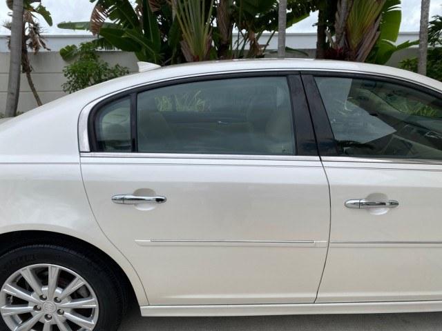2011 White Diamond Tricoat /Cocoa/Cashmere Buick Lucerne CXL LOW MILES 39,527 (1G4HC5EM2BU) with an 3.9L V6 SFI Flex-Fuel Engine engine, Automatic transmission, located at 4701 North Dixie Hwy, Pompano Beach, FL, 33064, (954) 422-2889, 26.240938, -80.123474 - OUR WEBPAGE FLORIDACARS1.COM HAS OVER 100 PHOTOS AND FREE CARFAX LINK 2011 Buick Lucerne CXL Sedan 4 DR 3.9L V6 F OHV 12V Flex Fuel 27 MPG Front Wheel Drive Features ABS Brakes Air Conditioning Alloy Wheels AM/FM Stereo Automatic Transmission Auxiliary Audio Input Blind Spot Monitor Bluetooth Techno- Photo#82