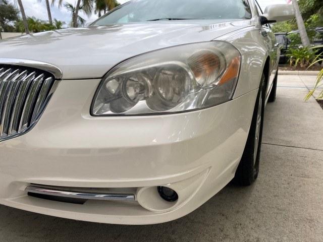 2011 White Diamond Tricoat /Cocoa/Cashmere Buick Lucerne CXL LOW MILES 39,527 (1G4HC5EM2BU) with an 3.9L V6 SFI Flex-Fuel Engine engine, Automatic transmission, located at 4701 North Dixie Hwy, Pompano Beach, FL, 33064, (954) 422-2889, 26.240938, -80.123474 - OUR WEBPAGE FLORIDACARS1.COM HAS OVER 100 PHOTOS AND FREE CARFAX LINK 2011 Buick Lucerne CXL Sedan 4 DR 3.9L V6 F OHV 12V Flex Fuel 27 MPG Front Wheel Drive Features ABS Brakes Air Conditioning Alloy Wheels AM/FM Stereo Automatic Transmission Auxiliary Audio Input Blind Spot Monitor Bluetooth Techno- Photo#91