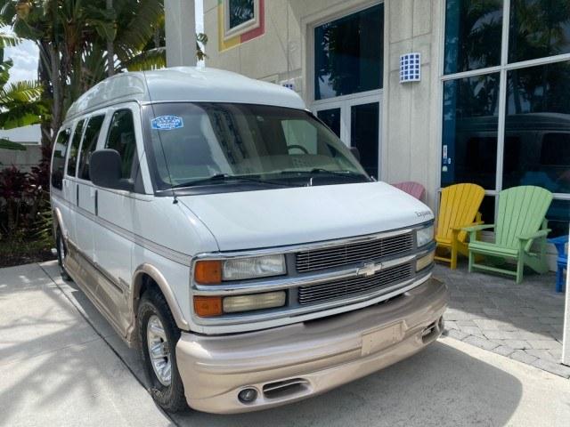 2002 Summit White /Neutral Chevrolet Express Van HI TOP EXPLORER CONV (1GBFG15R321) with an 5.7L Vortec 5700 SFI V8 Gas Engine engine, Automatic transmission, located at 4701 North Dixie Hwy, Pompano Beach, FL, 33064, (954) 422-2889, 26.240938, -80.123474 - OUR WEBPAGE FLORIDACARS1.COM HAS OVER 100 PHOTOS AND FREE CARFAX LINK 2002 Chevrolet Express G1500 Van 5.7L V8 F OHV Gasoline 17 MPG Rear Wheel Drive Features ABS Brakes Air Conditioning AM/FM Stereo Automatic Transmission Cassette Player CD Audio Power Locks Power Mirrors Power Seat(s) Power Window- Photo#1
