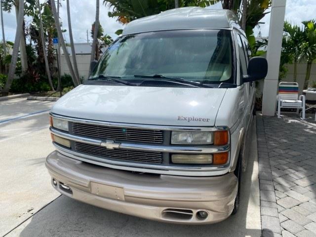 2002 Summit White /Neutral Chevrolet Express Van HI TOP EXPLORER CONV (1GBFG15R321) with an 5.7L Vortec 5700 SFI V8 Gas Engine engine, Automatic transmission, located at 4701 North Dixie Hwy, Pompano Beach, FL, 33064, (954) 422-2889, 26.240938, -80.123474 - OUR WEBPAGE FLORIDACARS1.COM HAS OVER 100 PHOTOS AND FREE CARFAX LINK 2002 Chevrolet Express G1500 Van 5.7L V8 F OHV Gasoline 17 MPG Rear Wheel Drive Features ABS Brakes Air Conditioning AM/FM Stereo Automatic Transmission Cassette Player CD Audio Power Locks Power Mirrors Power Seat(s) Power Window- Photo#3