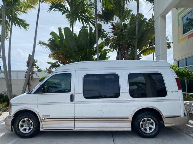 2002 Summit White /Neutral Chevrolet Express Van HI TOP EXPLORER CONV (1GBFG15R321) with an 5.7L Vortec 5700 SFI V8 Gas Engine engine, Automatic transmission, located at 4701 North Dixie Hwy, Pompano Beach, FL, 33064, (954) 422-2889, 26.240938, -80.123474 - OUR WEBPAGE FLORIDACARS1.COM HAS OVER 100 PHOTOS AND FREE CARFAX LINK 2002 Chevrolet Express G1500 Van 5.7L V8 F OHV Gasoline 17 MPG Rear Wheel Drive Features ABS Brakes Air Conditioning AM/FM Stereo Automatic Transmission Cassette Player CD Audio Power Locks Power Mirrors Power Seat(s) Power Window- Photo#4