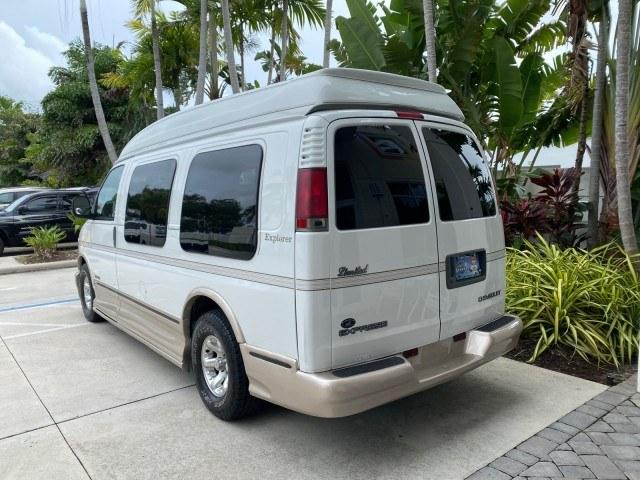 2002 Summit White /Neutral Chevrolet Express Van HI TOP EXPLORER CONV (1GBFG15R321) with an 5.7L Vortec 5700 SFI V8 Gas Engine engine, Automatic transmission, located at 4701 North Dixie Hwy, Pompano Beach, FL, 33064, (954) 422-2889, 26.240938, -80.123474 - OUR WEBPAGE FLORIDACARS1.COM HAS OVER 100 PHOTOS AND FREE CARFAX LINK 2002 Chevrolet Express G1500 Van 5.7L V8 F OHV Gasoline 17 MPG Rear Wheel Drive Features ABS Brakes Air Conditioning AM/FM Stereo Automatic Transmission Cassette Player CD Audio Power Locks Power Mirrors Power Seat(s) Power Window- Photo#5