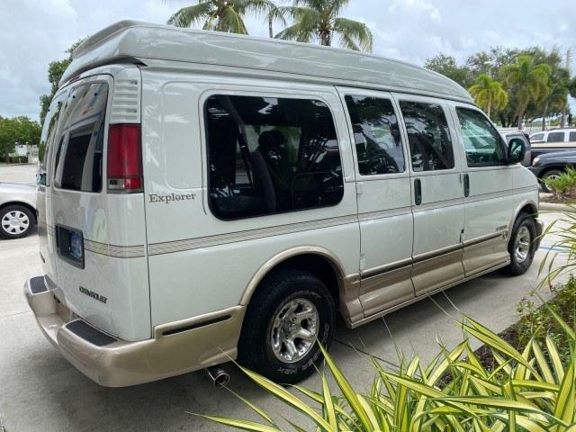 2002 Summit White /Neutral Chevrolet Express Van HI TOP EXPLORER CONV (1GBFG15R321) with an 5.7L Vortec 5700 SFI V8 Gas Engine engine, Automatic transmission, located at 4701 North Dixie Hwy, Pompano Beach, FL, 33064, (954) 422-2889, 26.240938, -80.123474 - OUR WEBPAGE FLORIDACARS1.COM HAS OVER 100 PHOTOS AND FREE CARFAX LINK 2002 Chevrolet Express G1500 Van 5.7L V8 F OHV Gasoline 17 MPG Rear Wheel Drive Features ABS Brakes Air Conditioning AM/FM Stereo Automatic Transmission Cassette Player CD Audio Power Locks Power Mirrors Power Seat(s) Power Window- Photo#7