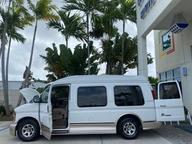 2002 Summit White /Neutral Chevrolet Express Van HI TOP EXPLORER CONV (1GBFG15R321) with an 5.7L Vortec 5700 SFI V8 Gas Engine engine, Automatic transmission, located at 4701 North Dixie Hwy, Pompano Beach, FL, 33064, (954) 422-2889, 26.240938, -80.123474 - OUR WEBPAGE FLORIDACARS1.COM HAS OVER 100 PHOTOS AND FREE CARFAX LINK 2002 Chevrolet Express G1500 Van 5.7L V8 F OHV Gasoline 17 MPG Rear Wheel Drive Features ABS Brakes Air Conditioning AM/FM Stereo Automatic Transmission Cassette Player CD Audio Power Locks Power Mirrors Power Seat(s) Power Window- Photo#8