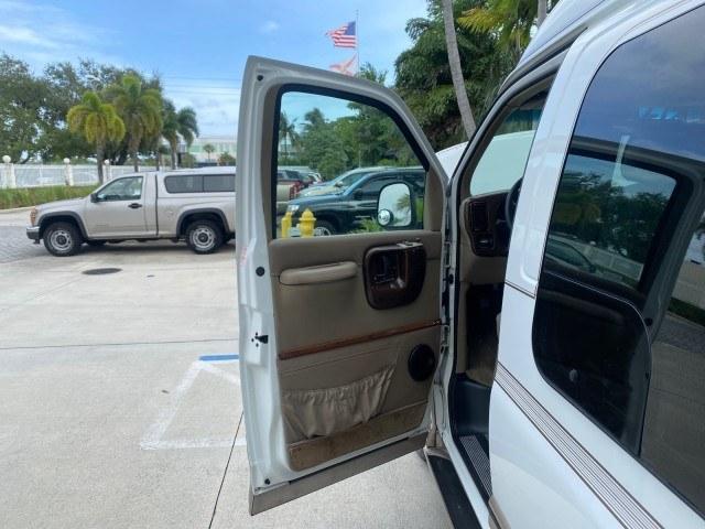 2002 Summit White /Neutral Chevrolet Express Van HI TOP EXPLORER CONV (1GBFG15R321) with an 5.7L Vortec 5700 SFI V8 Gas Engine engine, Automatic transmission, located at 4701 North Dixie Hwy, Pompano Beach, FL, 33064, (954) 422-2889, 26.240938, -80.123474 - OUR WEBPAGE FLORIDACARS1.COM HAS OVER 100 PHOTOS AND FREE CARFAX LINK 2002 Chevrolet Express G1500 Van 5.7L V8 F OHV Gasoline 17 MPG Rear Wheel Drive Features ABS Brakes Air Conditioning AM/FM Stereo Automatic Transmission Cassette Player CD Audio Power Locks Power Mirrors Power Seat(s) Power Window- Photo#9