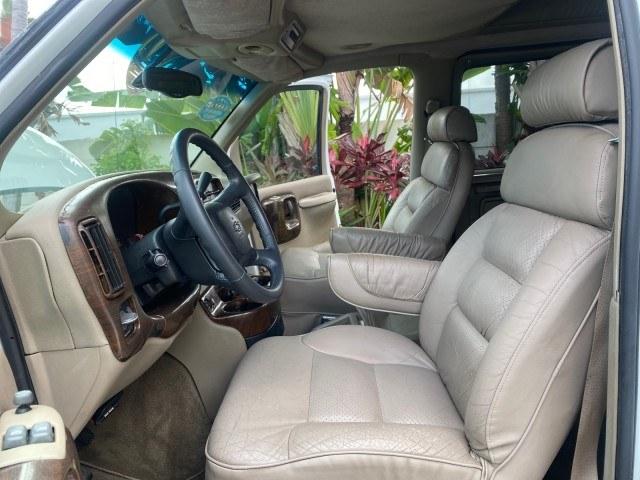2002 Summit White /Neutral Chevrolet Express Van HI TOP EXPLORER CONV (1GBFG15R321) with an 5.7L Vortec 5700 SFI V8 Gas Engine engine, Automatic transmission, located at 4701 North Dixie Hwy, Pompano Beach, FL, 33064, (954) 422-2889, 26.240938, -80.123474 - OUR WEBPAGE FLORIDACARS1.COM HAS OVER 100 PHOTOS AND FREE CARFAX LINK 2002 Chevrolet Express G1500 Van 5.7L V8 F OHV Gasoline 17 MPG Rear Wheel Drive Features ABS Brakes Air Conditioning AM/FM Stereo Automatic Transmission Cassette Player CD Audio Power Locks Power Mirrors Power Seat(s) Power Window- Photo#10