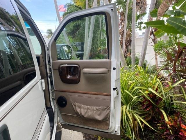 2002 Summit White /Neutral Chevrolet Express Van HI TOP EXPLORER CONV (1GBFG15R321) with an 5.7L Vortec 5700 SFI V8 Gas Engine engine, Automatic transmission, located at 4701 North Dixie Hwy, Pompano Beach, FL, 33064, (954) 422-2889, 26.240938, -80.123474 - OUR WEBPAGE FLORIDACARS1.COM HAS OVER 100 PHOTOS AND FREE CARFAX LINK 2002 Chevrolet Express G1500 Van 5.7L V8 F OHV Gasoline 17 MPG Rear Wheel Drive Features ABS Brakes Air Conditioning AM/FM Stereo Automatic Transmission Cassette Player CD Audio Power Locks Power Mirrors Power Seat(s) Power Window- Photo#11