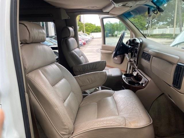 2002 Summit White /Neutral Chevrolet Express Van HI TOP EXPLORER CONV (1GBFG15R321) with an 5.7L Vortec 5700 SFI V8 Gas Engine engine, Automatic transmission, located at 4701 North Dixie Hwy, Pompano Beach, FL, 33064, (954) 422-2889, 26.240938, -80.123474 - OUR WEBPAGE FLORIDACARS1.COM HAS OVER 100 PHOTOS AND FREE CARFAX LINK 2002 Chevrolet Express G1500 Van 5.7L V8 F OHV Gasoline 17 MPG Rear Wheel Drive Features ABS Brakes Air Conditioning AM/FM Stereo Automatic Transmission Cassette Player CD Audio Power Locks Power Mirrors Power Seat(s) Power Window- Photo#12