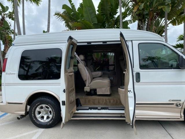 2002 Summit White /Neutral Chevrolet Express Van HI TOP EXPLORER CONV (1GBFG15R321) with an 5.7L Vortec 5700 SFI V8 Gas Engine engine, Automatic transmission, located at 4701 North Dixie Hwy, Pompano Beach, FL, 33064, (954) 422-2889, 26.240938, -80.123474 - OUR WEBPAGE FLORIDACARS1.COM HAS OVER 100 PHOTOS AND FREE CARFAX LINK 2002 Chevrolet Express G1500 Van 5.7L V8 F OHV Gasoline 17 MPG Rear Wheel Drive Features ABS Brakes Air Conditioning AM/FM Stereo Automatic Transmission Cassette Player CD Audio Power Locks Power Mirrors Power Seat(s) Power Window- Photo#13