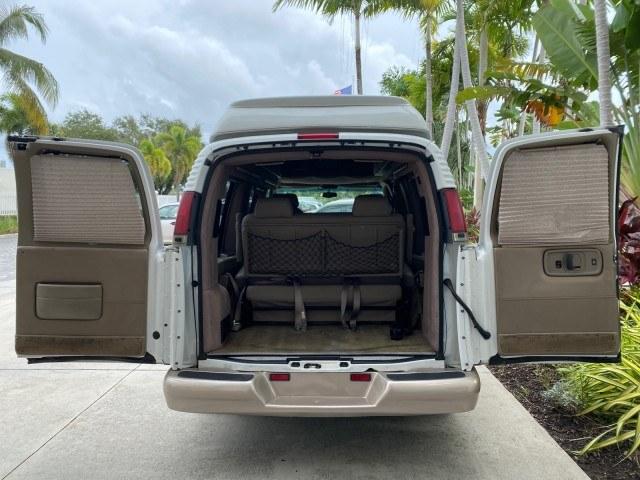 2002 Summit White /Neutral Chevrolet Express Van HI TOP EXPLORER CONV (1GBFG15R321) with an 5.7L Vortec 5700 SFI V8 Gas Engine engine, Automatic transmission, located at 4701 North Dixie Hwy, Pompano Beach, FL, 33064, (954) 422-2889, 26.240938, -80.123474 - OUR WEBPAGE FLORIDACARS1.COM HAS OVER 100 PHOTOS AND FREE CARFAX LINK 2002 Chevrolet Express G1500 Van 5.7L V8 F OHV Gasoline 17 MPG Rear Wheel Drive Features ABS Brakes Air Conditioning AM/FM Stereo Automatic Transmission Cassette Player CD Audio Power Locks Power Mirrors Power Seat(s) Power Window- Photo#15