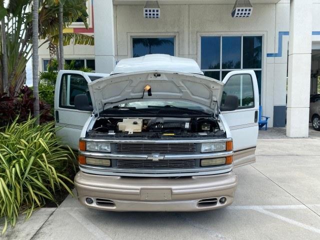 2002 Summit White /Neutral Chevrolet Express Van HI TOP EXPLORER CONV (1GBFG15R321) with an 5.7L Vortec 5700 SFI V8 Gas Engine engine, Automatic transmission, located at 4701 North Dixie Hwy, Pompano Beach, FL, 33064, (954) 422-2889, 26.240938, -80.123474 - OUR WEBPAGE FLORIDACARS1.COM HAS OVER 100 PHOTOS AND FREE CARFAX LINK 2002 Chevrolet Express G1500 Van 5.7L V8 F OHV Gasoline 17 MPG Rear Wheel Drive Features ABS Brakes Air Conditioning AM/FM Stereo Automatic Transmission Cassette Player CD Audio Power Locks Power Mirrors Power Seat(s) Power Window- Photo#16