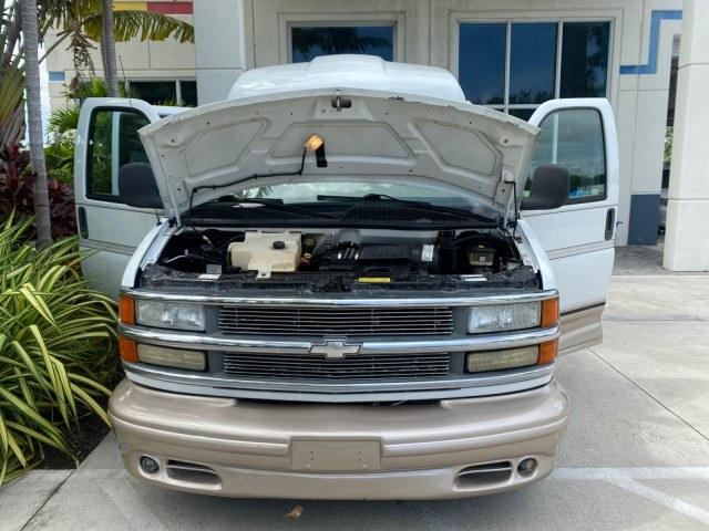2002 Summit White /Neutral Chevrolet Express Van HI TOP EXPLORER CONV (1GBFG15R321) with an 5.7L Vortec 5700 SFI V8 Gas Engine engine, Automatic transmission, located at 4701 North Dixie Hwy, Pompano Beach, FL, 33064, (954) 422-2889, 26.240938, -80.123474 - OUR WEBPAGE FLORIDACARS1.COM HAS OVER 100 PHOTOS AND FREE CARFAX LINK 2002 Chevrolet Express G1500 Van 5.7L V8 F OHV Gasoline 17 MPG Rear Wheel Drive Features ABS Brakes Air Conditioning AM/FM Stereo Automatic Transmission Cassette Player CD Audio Power Locks Power Mirrors Power Seat(s) Power Window- Photo#17