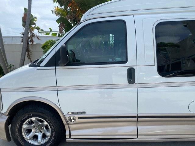 2002 Summit White /Neutral Chevrolet Express Van HI TOP EXPLORER CONV (1GBFG15R321) with an 5.7L Vortec 5700 SFI V8 Gas Engine engine, Automatic transmission, located at 4701 North Dixie Hwy, Pompano Beach, FL, 33064, (954) 422-2889, 26.240938, -80.123474 - OUR WEBPAGE FLORIDACARS1.COM HAS OVER 100 PHOTOS AND FREE CARFAX LINK 2002 Chevrolet Express G1500 Van 5.7L V8 F OHV Gasoline 17 MPG Rear Wheel Drive Features ABS Brakes Air Conditioning AM/FM Stereo Automatic Transmission Cassette Player CD Audio Power Locks Power Mirrors Power Seat(s) Power Window- Photo#26