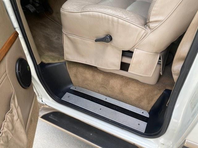 2002 Summit White /Neutral Chevrolet Express Van HI TOP EXPLORER CONV (1GBFG15R321) with an 5.7L Vortec 5700 SFI V8 Gas Engine engine, Automatic transmission, located at 4701 North Dixie Hwy, Pompano Beach, FL, 33064, (954) 422-2889, 26.240938, -80.123474 - OUR WEBPAGE FLORIDACARS1.COM HAS OVER 100 PHOTOS AND FREE CARFAX LINK 2002 Chevrolet Express G1500 Van 5.7L V8 F OHV Gasoline 17 MPG Rear Wheel Drive Features ABS Brakes Air Conditioning AM/FM Stereo Automatic Transmission Cassette Player CD Audio Power Locks Power Mirrors Power Seat(s) Power Window- Photo#31