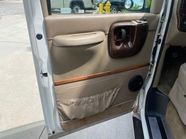 2002 Summit White /Neutral Chevrolet Express Van HI TOP EXPLORER CONV (1GBFG15R321) with an 5.7L Vortec 5700 SFI V8 Gas Engine engine, Automatic transmission, located at 4701 North Dixie Hwy, Pompano Beach, FL, 33064, (954) 422-2889, 26.240938, -80.123474 - OUR WEBPAGE FLORIDACARS1.COM HAS OVER 100 PHOTOS AND FREE CARFAX LINK 2002 Chevrolet Express G1500 Van 5.7L V8 F OHV Gasoline 17 MPG Rear Wheel Drive Features ABS Brakes Air Conditioning AM/FM Stereo Automatic Transmission Cassette Player CD Audio Power Locks Power Mirrors Power Seat(s) Power Window- Photo#32