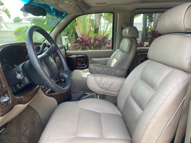 2002 Summit White /Neutral Chevrolet Express Van HI TOP EXPLORER CONV (1GBFG15R321) with an 5.7L Vortec 5700 SFI V8 Gas Engine engine, Automatic transmission, located at 4701 North Dixie Hwy, Pompano Beach, FL, 33064, (954) 422-2889, 26.240938, -80.123474 - OUR WEBPAGE FLORIDACARS1.COM HAS OVER 100 PHOTOS AND FREE CARFAX LINK 2002 Chevrolet Express G1500 Van 5.7L V8 F OHV Gasoline 17 MPG Rear Wheel Drive Features ABS Brakes Air Conditioning AM/FM Stereo Automatic Transmission Cassette Player CD Audio Power Locks Power Mirrors Power Seat(s) Power Window- Photo#33