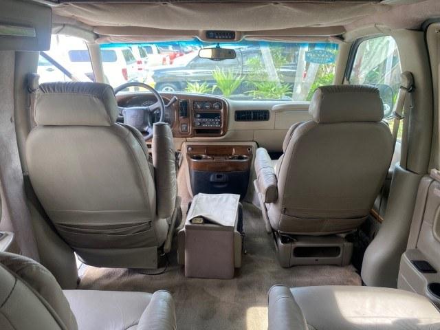 2002 Summit White /Neutral Chevrolet Express Van HI TOP EXPLORER CONV (1GBFG15R321) with an 5.7L Vortec 5700 SFI V8 Gas Engine engine, Automatic transmission, located at 4701 North Dixie Hwy, Pompano Beach, FL, 33064, (954) 422-2889, 26.240938, -80.123474 - OUR WEBPAGE FLORIDACARS1.COM HAS OVER 100 PHOTOS AND FREE CARFAX LINK 2002 Chevrolet Express G1500 Van 5.7L V8 F OHV Gasoline 17 MPG Rear Wheel Drive Features ABS Brakes Air Conditioning AM/FM Stereo Automatic Transmission Cassette Player CD Audio Power Locks Power Mirrors Power Seat(s) Power Window- Photo#54
