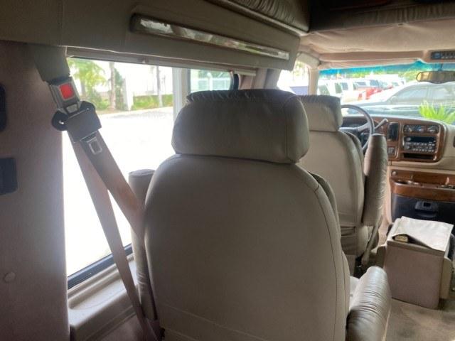 2002 Summit White /Neutral Chevrolet Express Van HI TOP EXPLORER CONV (1GBFG15R321) with an 5.7L Vortec 5700 SFI V8 Gas Engine engine, Automatic transmission, located at 4701 North Dixie Hwy, Pompano Beach, FL, 33064, (954) 422-2889, 26.240938, -80.123474 - OUR WEBPAGE FLORIDACARS1.COM HAS OVER 100 PHOTOS AND FREE CARFAX LINK 2002 Chevrolet Express G1500 Van 5.7L V8 F OHV Gasoline 17 MPG Rear Wheel Drive Features ABS Brakes Air Conditioning AM/FM Stereo Automatic Transmission Cassette Player CD Audio Power Locks Power Mirrors Power Seat(s) Power Window- Photo#57