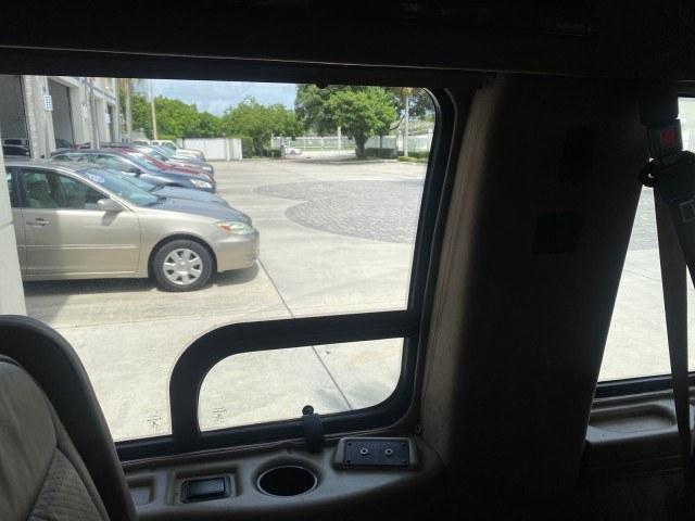 2002 Summit White /Neutral Chevrolet Express Van HI TOP EXPLORER CONV (1GBFG15R321) with an 5.7L Vortec 5700 SFI V8 Gas Engine engine, Automatic transmission, located at 4701 North Dixie Hwy, Pompano Beach, FL, 33064, (954) 422-2889, 26.240938, -80.123474 - OUR WEBPAGE FLORIDACARS1.COM HAS OVER 100 PHOTOS AND FREE CARFAX LINK 2002 Chevrolet Express G1500 Van 5.7L V8 F OHV Gasoline 17 MPG Rear Wheel Drive Features ABS Brakes Air Conditioning AM/FM Stereo Automatic Transmission Cassette Player CD Audio Power Locks Power Mirrors Power Seat(s) Power Window- Photo#58