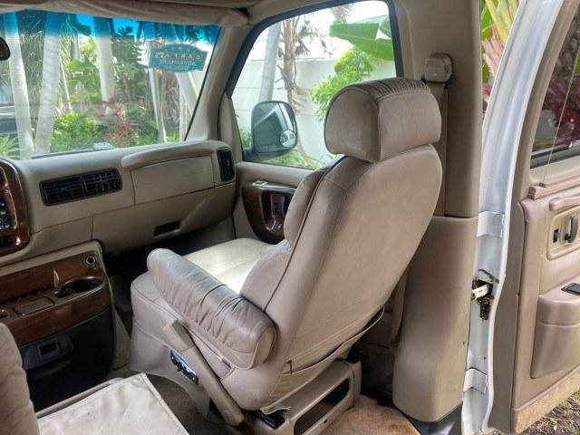 2002 Summit White /Neutral Chevrolet Express Van HI TOP EXPLORER CONV (1GBFG15R321) with an 5.7L Vortec 5700 SFI V8 Gas Engine engine, Automatic transmission, located at 4701 North Dixie Hwy, Pompano Beach, FL, 33064, (954) 422-2889, 26.240938, -80.123474 - OUR WEBPAGE FLORIDACARS1.COM HAS OVER 100 PHOTOS AND FREE CARFAX LINK 2002 Chevrolet Express G1500 Van 5.7L V8 F OHV Gasoline 17 MPG Rear Wheel Drive Features ABS Brakes Air Conditioning AM/FM Stereo Automatic Transmission Cassette Player CD Audio Power Locks Power Mirrors Power Seat(s) Power Window- Photo#62