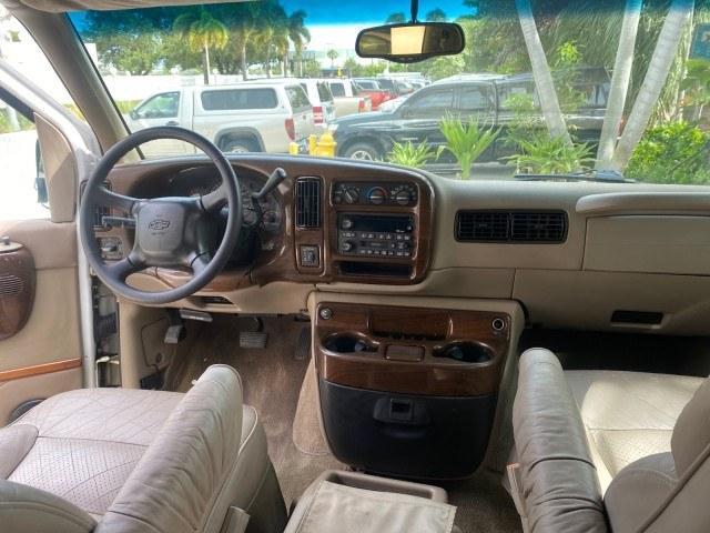 2002 Summit White /Neutral Chevrolet Express Van HI TOP EXPLORER CONV (1GBFG15R321) with an 5.7L Vortec 5700 SFI V8 Gas Engine engine, Automatic transmission, located at 4701 North Dixie Hwy, Pompano Beach, FL, 33064, (954) 422-2889, 26.240938, -80.123474 - OUR WEBPAGE FLORIDACARS1.COM HAS OVER 100 PHOTOS AND FREE CARFAX LINK 2002 Chevrolet Express G1500 Van 5.7L V8 F OHV Gasoline 17 MPG Rear Wheel Drive Features ABS Brakes Air Conditioning AM/FM Stereo Automatic Transmission Cassette Player CD Audio Power Locks Power Mirrors Power Seat(s) Power Window- Photo#64