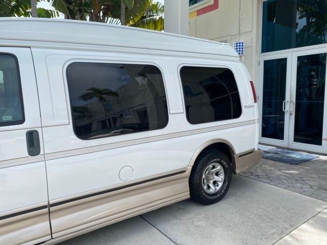2002 Summit White /Neutral Chevrolet Express Van HI TOP EXPLORER CONV (1GBFG15R321) with an 5.7L Vortec 5700 SFI V8 Gas Engine engine, Automatic transmission, located at 4701 North Dixie Hwy, Pompano Beach, FL, 33064, (954) 422-2889, 26.240938, -80.123474 - OUR WEBPAGE FLORIDACARS1.COM HAS OVER 100 PHOTOS AND FREE CARFAX LINK 2002 Chevrolet Express G1500 Van 5.7L V8 F OHV Gasoline 17 MPG Rear Wheel Drive Features ABS Brakes Air Conditioning AM/FM Stereo Automatic Transmission Cassette Player CD Audio Power Locks Power Mirrors Power Seat(s) Power Window- Photo#66