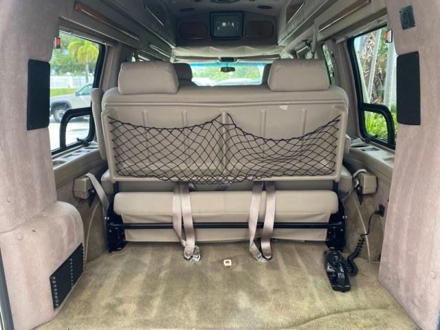 2002 Summit White /Neutral Chevrolet Express Van HI TOP EXPLORER CONV (1GBFG15R321) with an 5.7L Vortec 5700 SFI V8 Gas Engine engine, Automatic transmission, located at 4701 North Dixie Hwy, Pompano Beach, FL, 33064, (954) 422-2889, 26.240938, -80.123474 - OUR WEBPAGE FLORIDACARS1.COM HAS OVER 100 PHOTOS AND FREE CARFAX LINK 2002 Chevrolet Express G1500 Van 5.7L V8 F OHV Gasoline 17 MPG Rear Wheel Drive Features ABS Brakes Air Conditioning AM/FM Stereo Automatic Transmission Cassette Player CD Audio Power Locks Power Mirrors Power Seat(s) Power Window- Photo#78