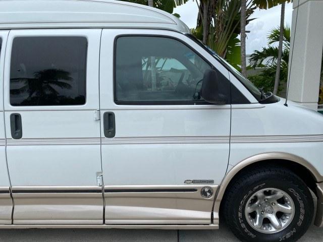 2002 Summit White /Neutral Chevrolet Express Van HI TOP EXPLORER CONV (1GBFG15R321) with an 5.7L Vortec 5700 SFI V8 Gas Engine engine, Automatic transmission, located at 4701 North Dixie Hwy, Pompano Beach, FL, 33064, (954) 422-2889, 26.240938, -80.123474 - OUR WEBPAGE FLORIDACARS1.COM HAS OVER 100 PHOTOS AND FREE CARFAX LINK 2002 Chevrolet Express G1500 Van 5.7L V8 F OHV Gasoline 17 MPG Rear Wheel Drive Features ABS Brakes Air Conditioning AM/FM Stereo Automatic Transmission Cassette Player CD Audio Power Locks Power Mirrors Power Seat(s) Power Window- Photo#87