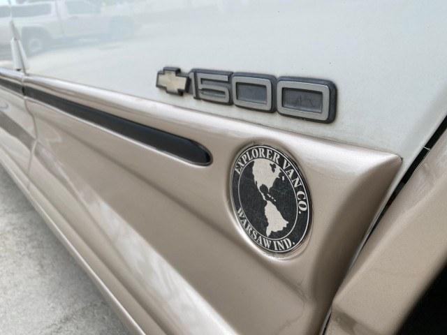 2002 Summit White /Neutral Chevrolet Express Van HI TOP EXPLORER CONV (1GBFG15R321) with an 5.7L Vortec 5700 SFI V8 Gas Engine engine, Automatic transmission, located at 4701 North Dixie Hwy, Pompano Beach, FL, 33064, (954) 422-2889, 26.240938, -80.123474 - OUR WEBPAGE FLORIDACARS1.COM HAS OVER 100 PHOTOS AND FREE CARFAX LINK 2002 Chevrolet Express G1500 Van 5.7L V8 F OHV Gasoline 17 MPG Rear Wheel Drive Features ABS Brakes Air Conditioning AM/FM Stereo Automatic Transmission Cassette Player CD Audio Power Locks Power Mirrors Power Seat(s) Power Window- Photo#91