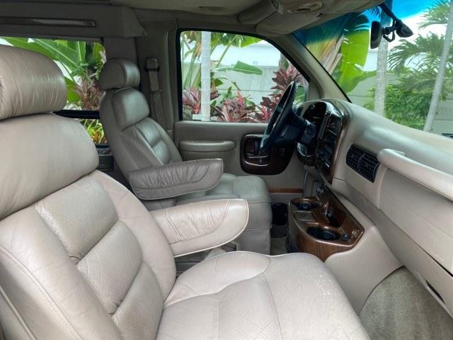 2002 Summit White /Neutral Chevrolet Express Van HI TOP EXPLORER CONV (1GBFG15R321) with an 5.7L Vortec 5700 SFI V8 Gas Engine engine, Automatic transmission, located at 4701 North Dixie Hwy, Pompano Beach, FL, 33064, (954) 422-2889, 26.240938, -80.123474 - OUR WEBPAGE FLORIDACARS1.COM HAS OVER 100 PHOTOS AND FREE CARFAX LINK 2002 Chevrolet Express G1500 Van 5.7L V8 F OHV Gasoline 17 MPG Rear Wheel Drive Features ABS Brakes Air Conditioning AM/FM Stereo Automatic Transmission Cassette Player CD Audio Power Locks Power Mirrors Power Seat(s) Power Window- Photo#95