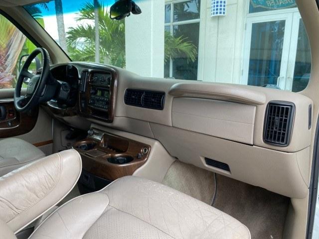 2002 Summit White /Neutral Chevrolet Express Van HI TOP EXPLORER CONV (1GBFG15R321) with an 5.7L Vortec 5700 SFI V8 Gas Engine engine, Automatic transmission, located at 4701 North Dixie Hwy, Pompano Beach, FL, 33064, (954) 422-2889, 26.240938, -80.123474 - OUR WEBPAGE FLORIDACARS1.COM HAS OVER 100 PHOTOS AND FREE CARFAX LINK 2002 Chevrolet Express G1500 Van 5.7L V8 F OHV Gasoline 17 MPG Rear Wheel Drive Features ABS Brakes Air Conditioning AM/FM Stereo Automatic Transmission Cassette Player CD Audio Power Locks Power Mirrors Power Seat(s) Power Window- Photo#97