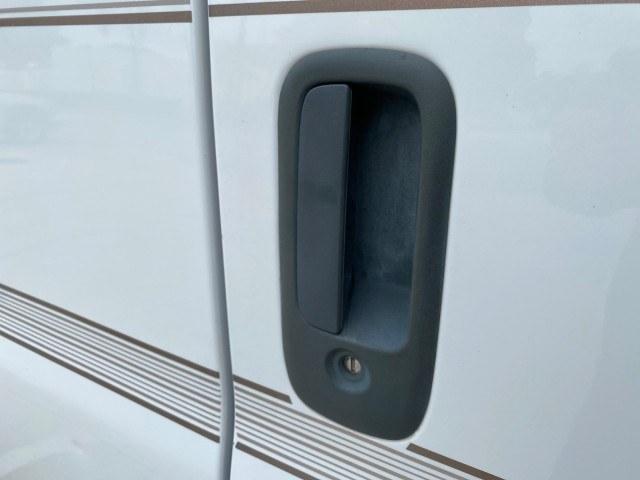 2002 Summit White /Neutral Chevrolet Express Van HI TOP EXPLORER CONV (1GBFG15R321) with an 5.7L Vortec 5700 SFI V8 Gas Engine engine, Automatic transmission, located at 4701 North Dixie Hwy, Pompano Beach, FL, 33064, (954) 422-2889, 26.240938, -80.123474 - OUR WEBPAGE FLORIDACARS1.COM HAS OVER 100 PHOTOS AND FREE CARFAX LINK 2002 Chevrolet Express G1500 Van 5.7L V8 F OHV Gasoline 17 MPG Rear Wheel Drive Features ABS Brakes Air Conditioning AM/FM Stereo Automatic Transmission Cassette Player CD Audio Power Locks Power Mirrors Power Seat(s) Power Window- Photo#99