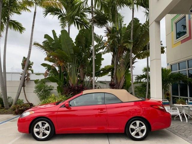 2006 Absolutely Red /Ivory Toyota Camry Solara SLE V6 LOW MILES 82,218 1 OWNER (4T1FA38P16U) with an 3.3L DOHC SMPI 24-Valve V6 Engine engine, Automatic transmission, located at 4701 North Dixie Hwy, Pompano Beach, FL, 33064, (954) 422-2889, 26.240938, -80.123474 - OUR WEBPAGE FLORIDACARS1.COM HAS OVER 100 PHOTOS AND FREE CARFAX LINK 2006 Toyota Camry Solara SLE V6 1 OWNER Convertible 3.3L V6 F DOHC 24V Gasoline 29 MPG Front Wheel Drive Features ABS Brakes Air Conditioning Alloy Wheels AM/FM Stereo Automatic Transmission CD Audio Cruise Control Front Seat Heat- Photo#4