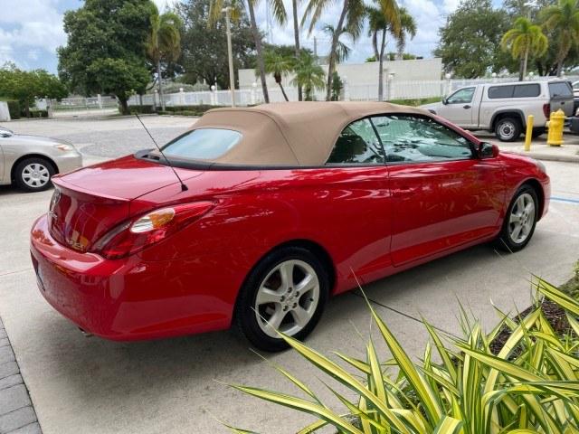 2006 Absolutely Red /Ivory Toyota Camry Solara SLE V6 LOW MILES 82,218 1 OWNER (4T1FA38P16U) with an 3.3L DOHC SMPI 24-Valve V6 Engine engine, Automatic transmission, located at 4701 North Dixie Hwy, Pompano Beach, FL, 33064, (954) 422-2889, 26.240938, -80.123474 - OUR WEBPAGE FLORIDACARS1.COM HAS OVER 100 PHOTOS AND FREE CARFAX LINK 2006 Toyota Camry Solara SLE V6 1 OWNER Convertible 3.3L V6 F DOHC 24V Gasoline 29 MPG Front Wheel Drive Features ABS Brakes Air Conditioning Alloy Wheels AM/FM Stereo Automatic Transmission CD Audio Cruise Control Front Seat Heat- Photo#7