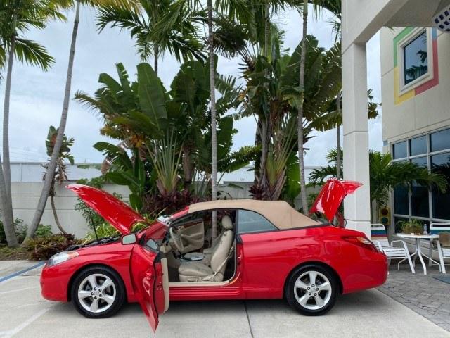 2006 Absolutely Red /Ivory Toyota Camry Solara SLE V6 LOW MILES 82,218 1 OWNER (4T1FA38P16U) with an 3.3L DOHC SMPI 24-Valve V6 Engine engine, Automatic transmission, located at 4701 North Dixie Hwy, Pompano Beach, FL, 33064, (954) 422-2889, 26.240938, -80.123474 - OUR WEBPAGE FLORIDACARS1.COM HAS OVER 100 PHOTOS AND FREE CARFAX LINK 2006 Toyota Camry Solara SLE V6 1 OWNER Convertible 3.3L V6 F DOHC 24V Gasoline 29 MPG Front Wheel Drive Features ABS Brakes Air Conditioning Alloy Wheels AM/FM Stereo Automatic Transmission CD Audio Cruise Control Front Seat Heat- Photo#8