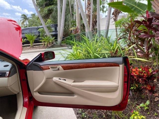 2006 Absolutely Red /Ivory Toyota Camry Solara SLE V6 LOW MILES 82,218 1 OWNER (4T1FA38P16U) with an 3.3L DOHC SMPI 24-Valve V6 Engine engine, Automatic transmission, located at 4701 North Dixie Hwy, Pompano Beach, FL, 33064, (954) 422-2889, 26.240938, -80.123474 - OUR WEBPAGE FLORIDACARS1.COM HAS OVER 100 PHOTOS AND FREE CARFAX LINK 2006 Toyota Camry Solara SLE V6 1 OWNER Convertible 3.3L V6 F DOHC 24V Gasoline 29 MPG Front Wheel Drive Features ABS Brakes Air Conditioning Alloy Wheels AM/FM Stereo Automatic Transmission CD Audio Cruise Control Front Seat Heat- Photo#11