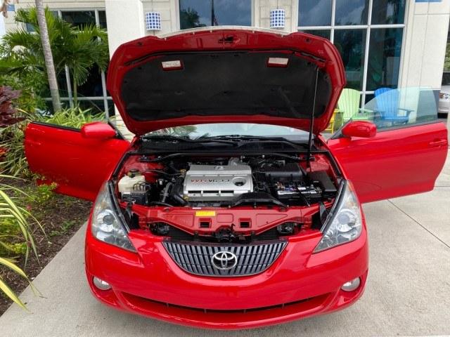 2006 Absolutely Red /Ivory Toyota Camry Solara SLE V6 LOW MILES 82,218 1 OWNER (4T1FA38P16U) with an 3.3L DOHC SMPI 24-Valve V6 Engine engine, Automatic transmission, located at 4701 North Dixie Hwy, Pompano Beach, FL, 33064, (954) 422-2889, 26.240938, -80.123474 - OUR WEBPAGE FLORIDACARS1.COM HAS OVER 100 PHOTOS AND FREE CARFAX LINK 2006 Toyota Camry Solara SLE V6 1 OWNER Convertible 3.3L V6 F DOHC 24V Gasoline 29 MPG Front Wheel Drive Features ABS Brakes Air Conditioning Alloy Wheels AM/FM Stereo Automatic Transmission CD Audio Cruise Control Front Seat Heat- Photo#17