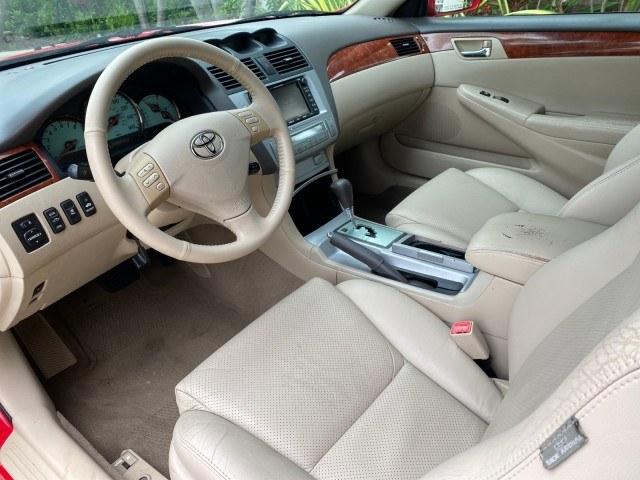 2006 Absolutely Red /Ivory Toyota Camry Solara SLE V6 LOW MILES 82,218 1 OWNER (4T1FA38P16U) with an 3.3L DOHC SMPI 24-Valve V6 Engine engine, Automatic transmission, located at 4701 North Dixie Hwy, Pompano Beach, FL, 33064, (954) 422-2889, 26.240938, -80.123474 - OUR WEBPAGE FLORIDACARS1.COM HAS OVER 100 PHOTOS AND FREE CARFAX LINK 2006 Toyota Camry Solara SLE V6 1 OWNER Convertible 3.3L V6 F DOHC 24V Gasoline 29 MPG Front Wheel Drive Features ABS Brakes Air Conditioning Alloy Wheels AM/FM Stereo Automatic Transmission CD Audio Cruise Control Front Seat Heat- Photo#43