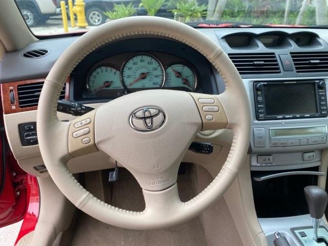 2006 Absolutely Red /Ivory Toyota Camry Solara SLE V6 LOW MILES 82,218 1 OWNER (4T1FA38P16U) with an 3.3L DOHC SMPI 24-Valve V6 Engine engine, Automatic transmission, located at 4701 North Dixie Hwy, Pompano Beach, FL, 33064, (954) 422-2889, 26.240938, -80.123474 - OUR WEBPAGE FLORIDACARS1.COM HAS OVER 100 PHOTOS AND FREE CARFAX LINK 2006 Toyota Camry Solara SLE V6 1 OWNER Convertible 3.3L V6 F DOHC 24V Gasoline 29 MPG Front Wheel Drive Features ABS Brakes Air Conditioning Alloy Wheels AM/FM Stereo Automatic Transmission CD Audio Cruise Control Front Seat Heat- Photo#44