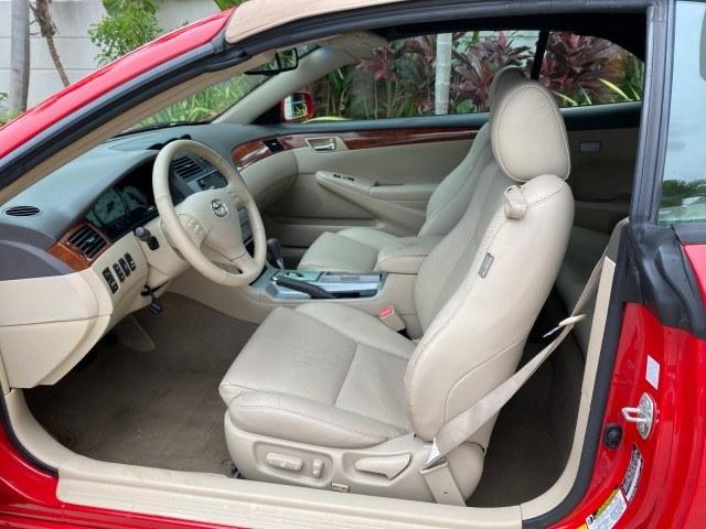 2006 Absolutely Red /Ivory Toyota Camry Solara SLE V6 LOW MILES 82,218 1 OWNER (4T1FA38P16U) with an 3.3L DOHC SMPI 24-Valve V6 Engine engine, Automatic transmission, located at 4701 North Dixie Hwy, Pompano Beach, FL, 33064, (954) 422-2889, 26.240938, -80.123474 - OUR WEBPAGE FLORIDACARS1.COM HAS OVER 100 PHOTOS AND FREE CARFAX LINK 2006 Toyota Camry Solara SLE V6 1 OWNER Convertible 3.3L V6 F DOHC 24V Gasoline 29 MPG Front Wheel Drive Features ABS Brakes Air Conditioning Alloy Wheels AM/FM Stereo Automatic Transmission CD Audio Cruise Control Front Seat Heat- Photo#63