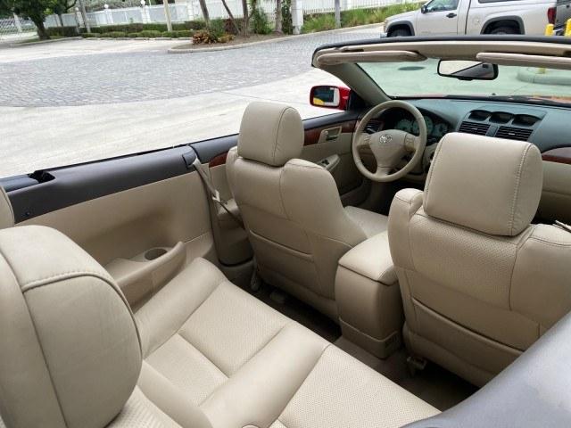 2006 Absolutely Red /Ivory Toyota Camry Solara SLE V6 LOW MILES 82,218 1 OWNER (4T1FA38P16U) with an 3.3L DOHC SMPI 24-Valve V6 Engine engine, Automatic transmission, located at 4701 North Dixie Hwy, Pompano Beach, FL, 33064, (954) 422-2889, 26.240938, -80.123474 - OUR WEBPAGE FLORIDACARS1.COM HAS OVER 100 PHOTOS AND FREE CARFAX LINK 2006 Toyota Camry Solara SLE V6 1 OWNER Convertible 3.3L V6 F DOHC 24V Gasoline 29 MPG Front Wheel Drive Features ABS Brakes Air Conditioning Alloy Wheels AM/FM Stereo Automatic Transmission CD Audio Cruise Control Front Seat Heat- Photo#84