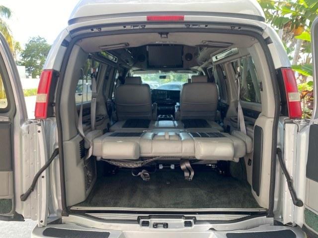 2013 Pure Silver Metallic /Neutral GMC Savana HIGH TOP CONV VAN HIGH TOP CONV LOW MILES 27,511 1 OWNER (1GDS7DC43D1) with an 5.3L Vortec 1000 V8 SFI Flex-Fuel Engine engine, Automatic transmission, located at 4701 North Dixie Hwy, Pompano Beach, FL, 33064, (954) 422-2889, 26.240938, -80.123474 - OUR WEBPAGE FLORIDACARS1.COM HAS OVER 100 PHOTOS AND FREE CARFAX LINK 2013 GMC Savana 1500 1 OWNER Van 5.3L V8 F OHV 16V Flex Fuel 17 MPG Rear Wheel Drive Features ABS Brakes Air Conditioning Alloy Wheels AM/FM Stereo Automatic Transmission Auxiliary Audio Input CD Audio Convenience Package Cruise C- Photo#95