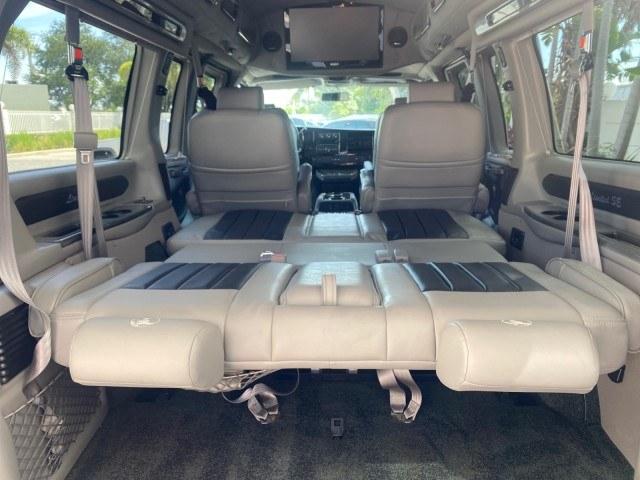 2013 Pure Silver Metallic /Neutral GMC Savana HIGH TOP CONV VAN HIGH TOP CONV LOW MILES 27,511 1 OWNER (1GDS7DC43D1) with an 5.3L Vortec 1000 V8 SFI Flex-Fuel Engine engine, Automatic transmission, located at 4701 North Dixie Hwy, Pompano Beach, FL, 33064, (954) 422-2889, 26.240938, -80.123474 - OUR WEBPAGE FLORIDACARS1.COM HAS OVER 100 PHOTOS AND FREE CARFAX LINK 2013 GMC Savana 1500 1 OWNER Van 5.3L V8 F OHV 16V Flex Fuel 17 MPG Rear Wheel Drive Features ABS Brakes Air Conditioning Alloy Wheels AM/FM Stereo Automatic Transmission Auxiliary Audio Input CD Audio Convenience Package Cruise C- Photo#96