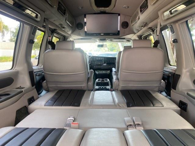 2013 Pure Silver Metallic /Neutral GMC Savana HIGH TOP CONV VAN HIGH TOP CONV LOW MILES 27,511 1 OWNER (1GDS7DC43D1) with an 5.3L Vortec 1000 V8 SFI Flex-Fuel Engine engine, Automatic transmission, located at 4701 North Dixie Hwy, Pompano Beach, FL, 33064, (954) 422-2889, 26.240938, -80.123474 - OUR WEBPAGE FLORIDACARS1.COM HAS OVER 100 PHOTOS AND FREE CARFAX LINK 2013 GMC Savana 1500 1 OWNER Van 5.3L V8 F OHV 16V Flex Fuel 17 MPG Rear Wheel Drive Features ABS Brakes Air Conditioning Alloy Wheels AM/FM Stereo Automatic Transmission Auxiliary Audio Input CD Audio Convenience Package Cruise C- Photo#97