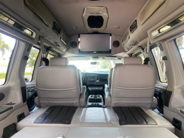 2013 Pure Silver Metallic /Neutral GMC Savana HIGH TOP CONV VAN HIGH TOP CONV LOW MILES 27,511 1 OWNER (1GDS7DC43D1) with an 5.3L Vortec 1000 V8 SFI Flex-Fuel Engine engine, Automatic transmission, located at 4701 North Dixie Hwy, Pompano Beach, FL, 33064, (954) 422-2889, 26.240938, -80.123474 - OUR WEBPAGE FLORIDACARS1.COM HAS OVER 100 PHOTOS AND FREE CARFAX LINK 2013 GMC Savana 1500 1 OWNER Van 5.3L V8 F OHV 16V Flex Fuel 17 MPG Rear Wheel Drive Features ABS Brakes Air Conditioning Alloy Wheels AM/FM Stereo Automatic Transmission Auxiliary Audio Input CD Audio Convenience Package Cruise C- Photo#98