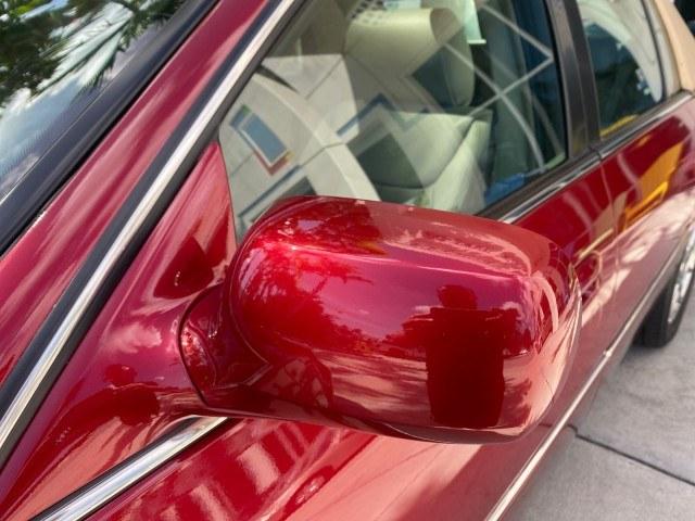 2011 Crystal Red Tintcoat /Shale/Cocoa Cadillac DTS LOW MILES 66,888 1 OWNER (1G6KD5E63BU) with an Northstar 4.6L DOHC V8 Engine engine, Automatic transmission, located at 4701 North Dixie Hwy, Pompano Beach, FL, 33064, (954) 422-2889, 26.240938, -80.123474 - OUR WEBPAGE FLORIDACARS1.COM HAS OVER 100 PHOTOS AND FREE CARFAX LINK 2011 Cadillac DTS Luxury Collection 1 OWNER Sedan 4 DR 4.6L V8 F DOHC 32V Gasoline 23 MPG Front Wheel Drive Features A/C Seat(s) ABS Brakes Air Conditioning Alloy Wheels AM/FM Stereo Automated Cruise Control Automatic Transmission- Photo#29
