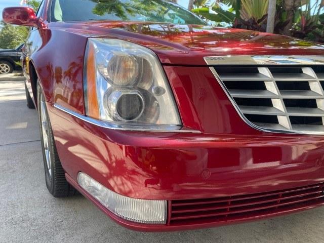 2011 Crystal Red Tintcoat /Shale/Cocoa Cadillac DTS LOW MILES 66,888 1 OWNER (1G6KD5E63BU) with an Northstar 4.6L DOHC V8 Engine engine, Automatic transmission, located at 4701 North Dixie Hwy, Pompano Beach, FL, 33064, (954) 422-2889, 26.240938, -80.123474 - OUR WEBPAGE FLORIDACARS1.COM HAS OVER 100 PHOTOS AND FREE CARFAX LINK 2011 Cadillac DTS Luxury Collection 1 OWNER Sedan 4 DR 4.6L V8 F DOHC 32V Gasoline 23 MPG Front Wheel Drive Features A/C Seat(s) ABS Brakes Air Conditioning Alloy Wheels AM/FM Stereo Automated Cruise Control Automatic Transmission- Photo#90