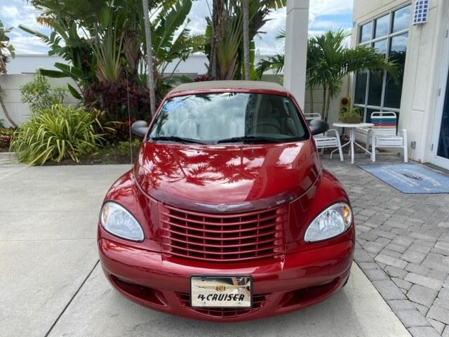 2005 Inferno Red Crystal Pearl /Taupe/Pearl Beige Chrysler PT Cruiser Touring CONV LOW MILES 34,462 (3C3AY55E85T) with an 2.4L DOHC SMPI 16-Valve I4 Engine engine, Automatic transmission, located at 4701 North Dixie Hwy, Pompano Beach, FL, 33064, (954) 422-2889, 26.240938, -80.123474 - OUR WEBPAGE FLORIDACARS1.COM HAS OVER 100 PHOTOS AND FREE CARFAX LINK 2005 Chrysler PT Cruiser Touring Convertible 2.4L I4 F DOHC 16V Gasoline 29 MPG Front Wheel Drive Features ABS Brakes Air Conditioning Alloy Wheels AM/FM Stereo Automatic Transmission Cassette Player CD Audio Cruise Control Leathe- Photo#2
