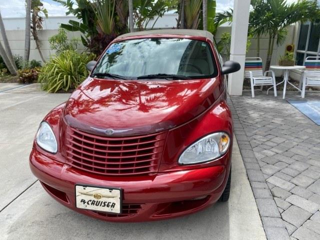 2005 Inferno Red Crystal Pearl /Taupe/Pearl Beige Chrysler PT Cruiser Touring CONV LOW MILES 34,462 (3C3AY55E85T) with an 2.4L DOHC SMPI 16-Valve I4 Engine engine, Automatic transmission, located at 4701 North Dixie Hwy, Pompano Beach, FL, 33064, (954) 422-2889, 26.240938, -80.123474 - OUR WEBPAGE FLORIDACARS1.COM HAS OVER 100 PHOTOS AND FREE CARFAX LINK 2005 Chrysler PT Cruiser Touring Convertible 2.4L I4 F DOHC 16V Gasoline 29 MPG Front Wheel Drive Features ABS Brakes Air Conditioning Alloy Wheels AM/FM Stereo Automatic Transmission Cassette Player CD Audio Cruise Control Leathe- Photo#3